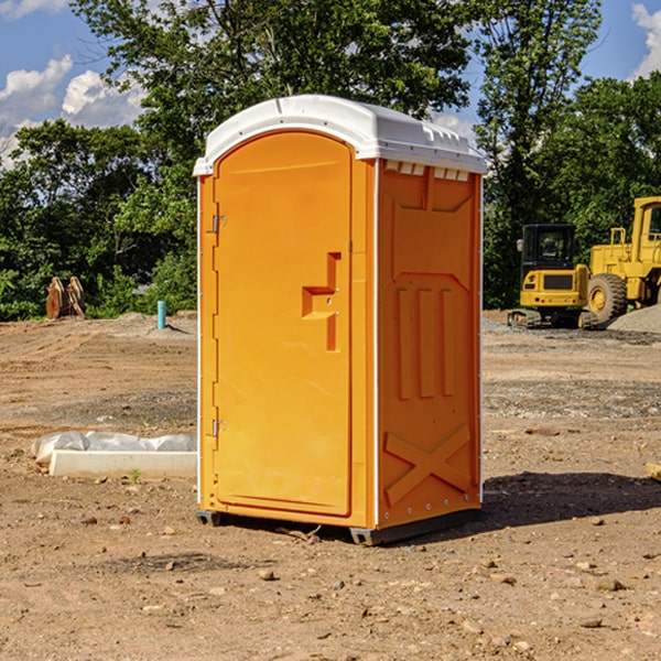 how often are the portable restrooms cleaned and serviced during a rental period in Slade